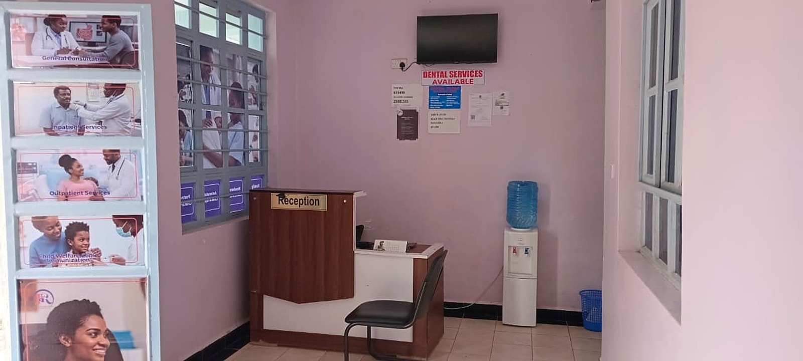 Hospital reception desk with service information displays at Joska Royal Care Hospital